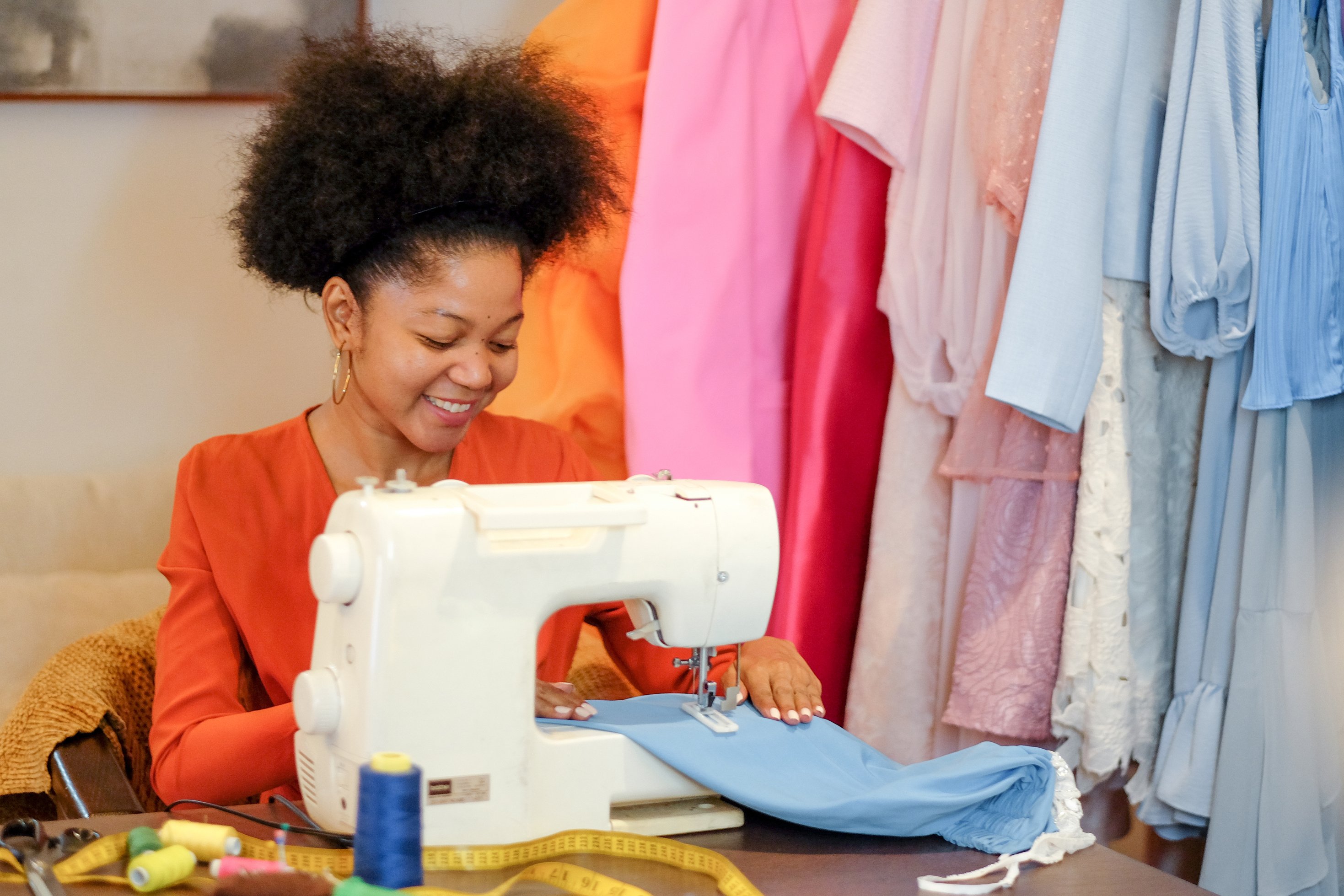 Woman Sewing a Dress